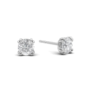 One-carat diamond stud earrings set in 18 karat white gold rhodium polished with classic four-prong claw settings, showcasing timeless elegance and brilliance.